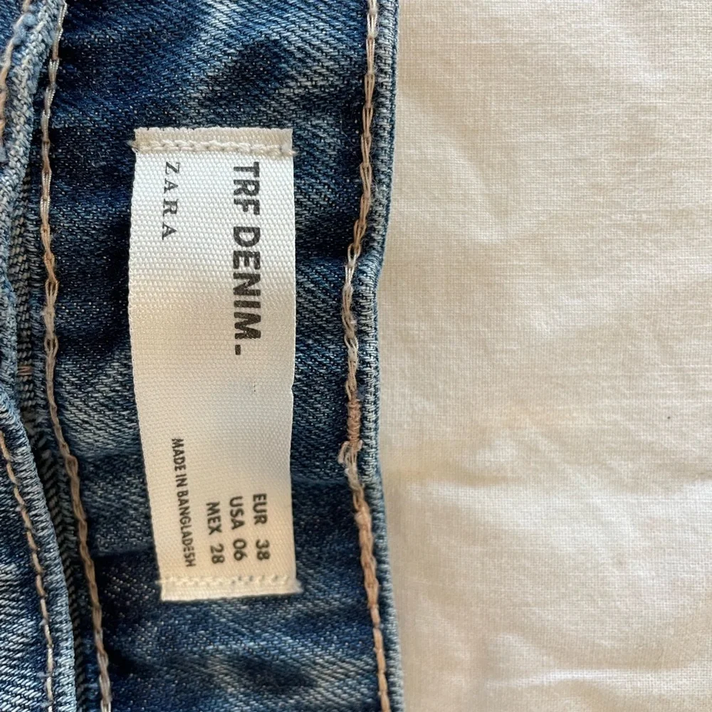 Zara jean shorts. Lots of distress and‎ very short.
